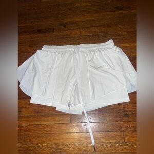 White tennis flowy skort.